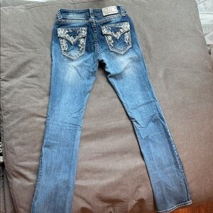 Low rise Grace bootcut Jeans with Detailed Pockets